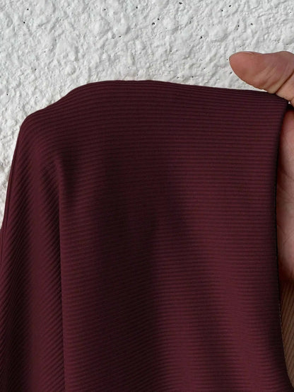 Bodysuit — Maroon fabric with subtle ribbed texture, close up view — 18 — view 18