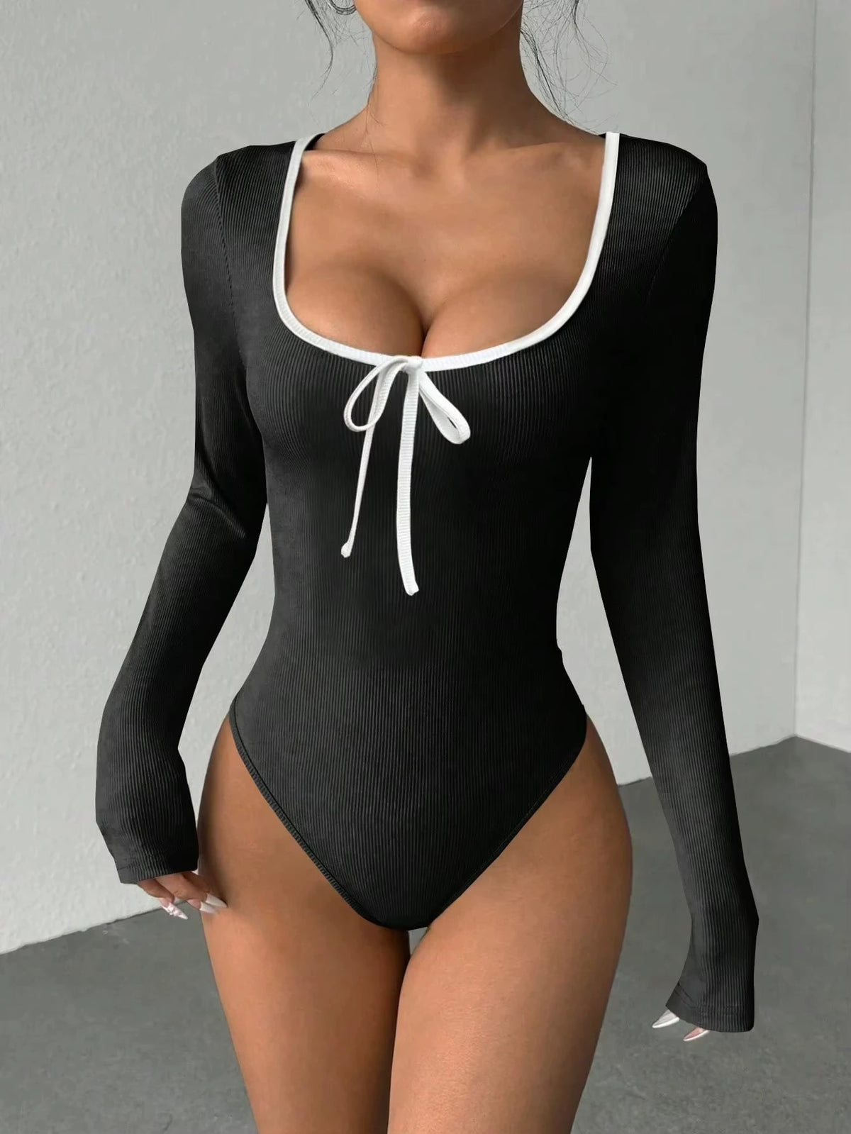 Black long sleeve bodysuit with U neck and bowknot detail, color block design — view 4 — view 4