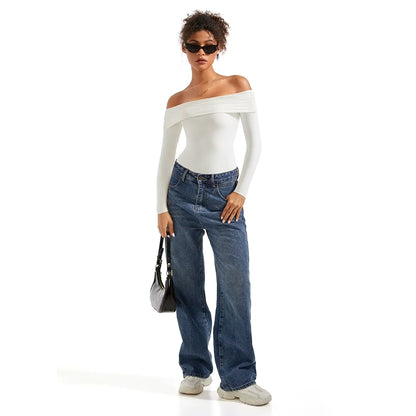 Off shoulder slim fit long sleeve bodysuit in white, worn with blue jeans — view 9 — view 9