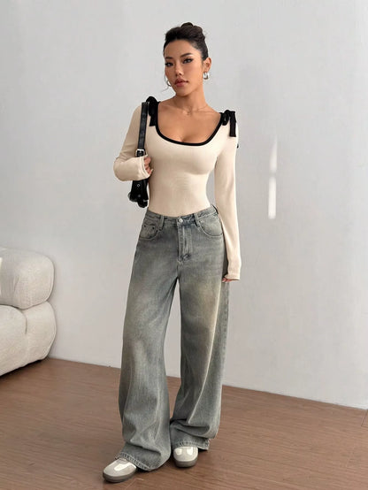 Cream color block rib knit long sleeve bodysuit with scoop neckline, worn gray jeans — view 5 — view 5