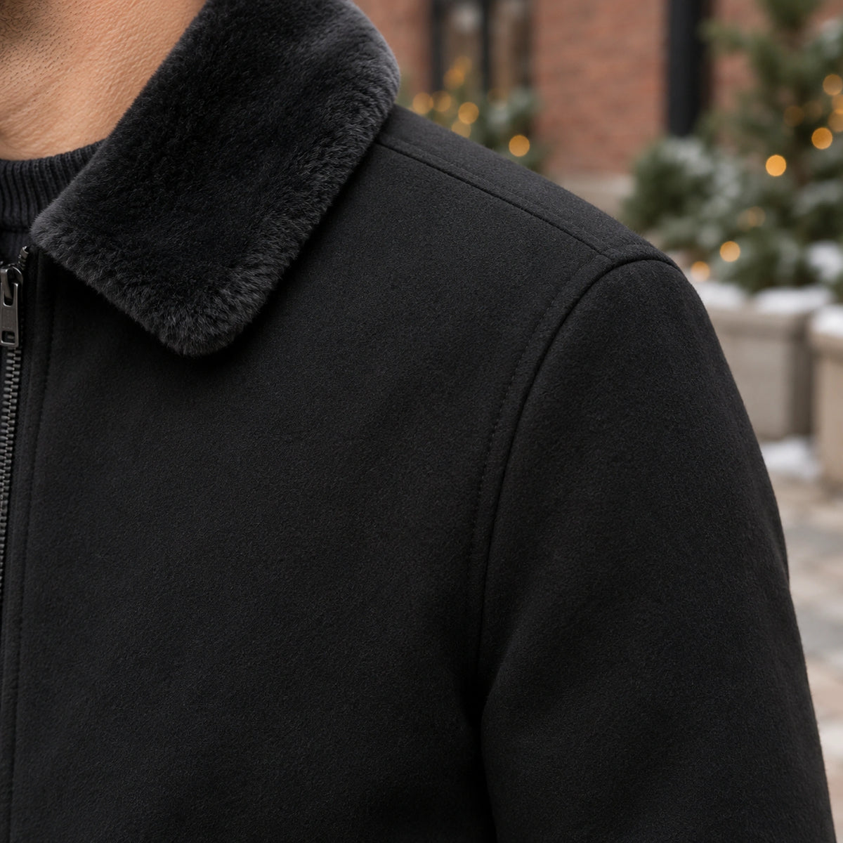 Men's Faux Fur Collar Bomber Jacket — Noah — Black — close up of the shoulder seam and softly textured shell — view 13
