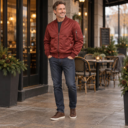 Men's Lightweight Utility Bomber Jacket — Hector — Brick Red — full outfit while standing naturally by a sheltered — view 11