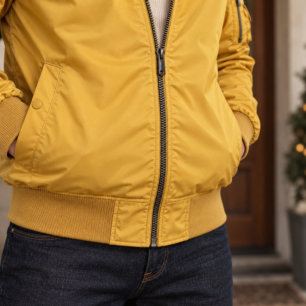 Men's Lightweight Utility Bomber Jacket — Hector — Mustard Yellow — close up of the rib hem and zipper base — view 17