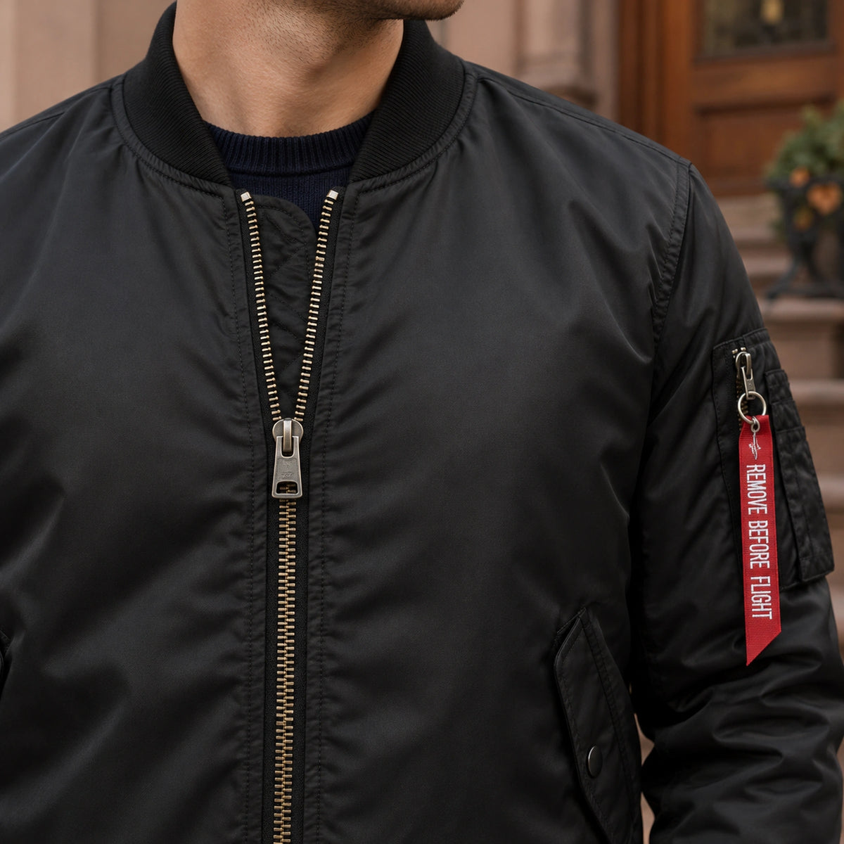 Men's Zip Front Bomber Jacket — Joey — Black — close up of the zipper teeth, puller and adjacent stitching — view 14