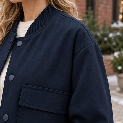 Women's Snap Front Pocket Bomber Jacket — Mira — Navy — close up of the dropped shoulder seam and matte texture — view 14