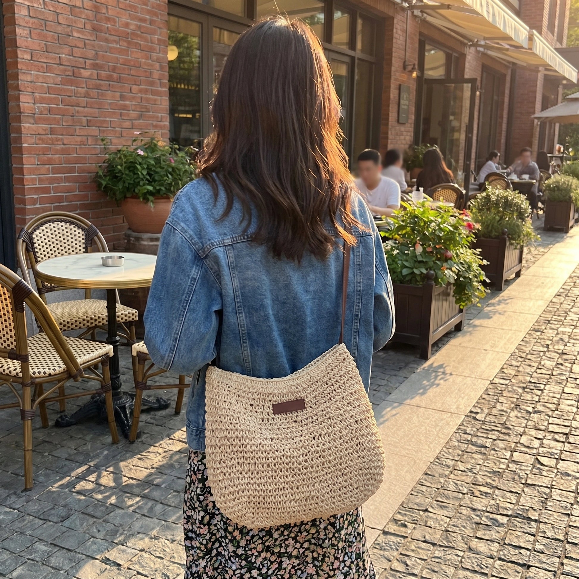 Back view of the Womens Woven Summer Bag showing its intricate woven texture and design, perfect for beach holidays and everyday use.