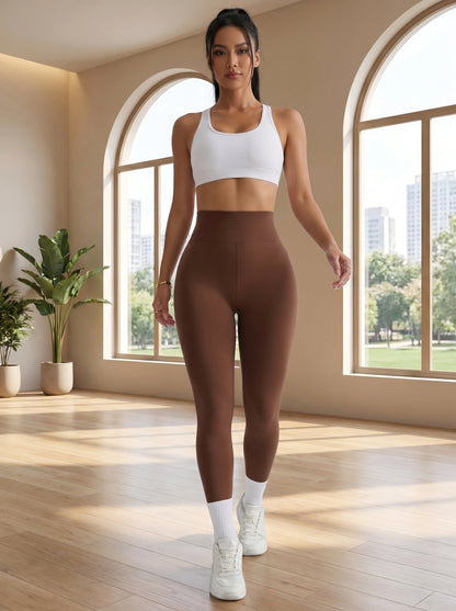 Close up view of the Womens Versatile High Waisted Leggings showing the soft, stretchy fabric and precise stitching details, ideal for gym or casual wear.
