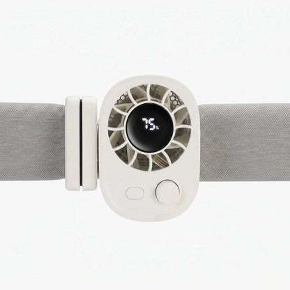 View of a compact clip on fan showcasing its adjustable base, power button, and degree rotation mechanism