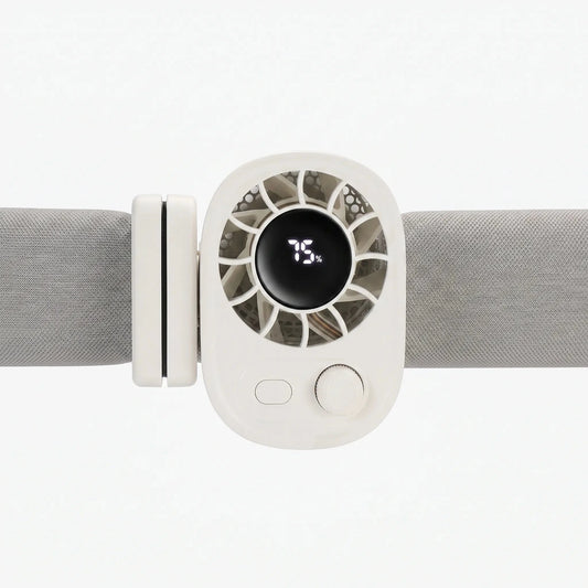 View of a compact clip on fan showcasing its adjustable base, power button, and degree rotation mechanism