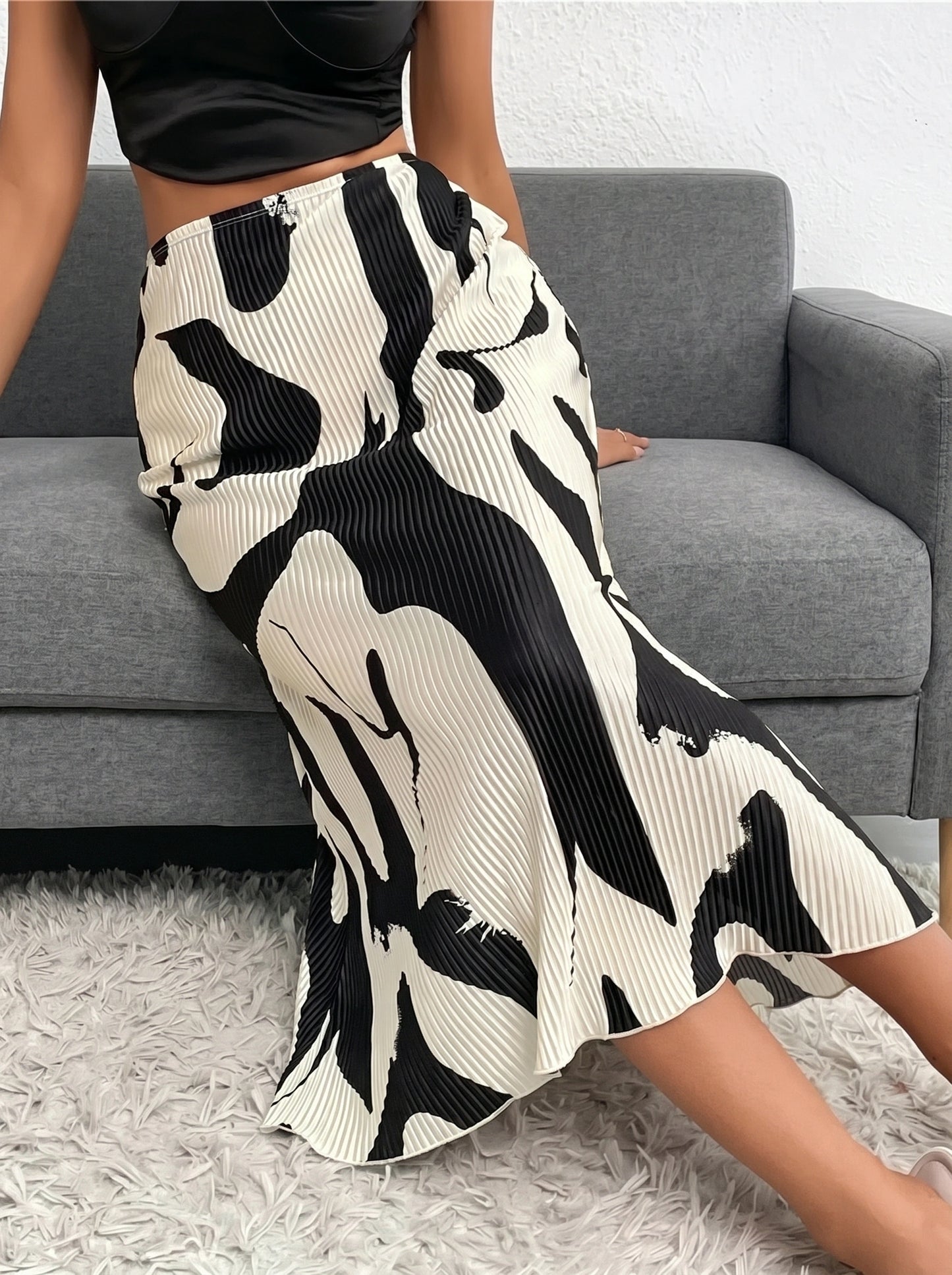 Close up of the Womens Artsy Sophisticated Autumn Midi Skirt showing its rich fabric texture and precise stitching, set against a neutral background.