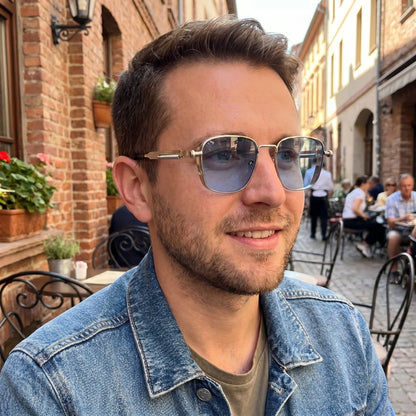 Close up view of the sleek frame and polished lenses of Men's Sleek Summer Sunglasses, showing premium craftsmanship against a soft, neutral background.