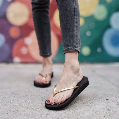 Lightweight flat beach sandals for women in vibrant coral, featuring adjustable straps and a cushioned footbed, view