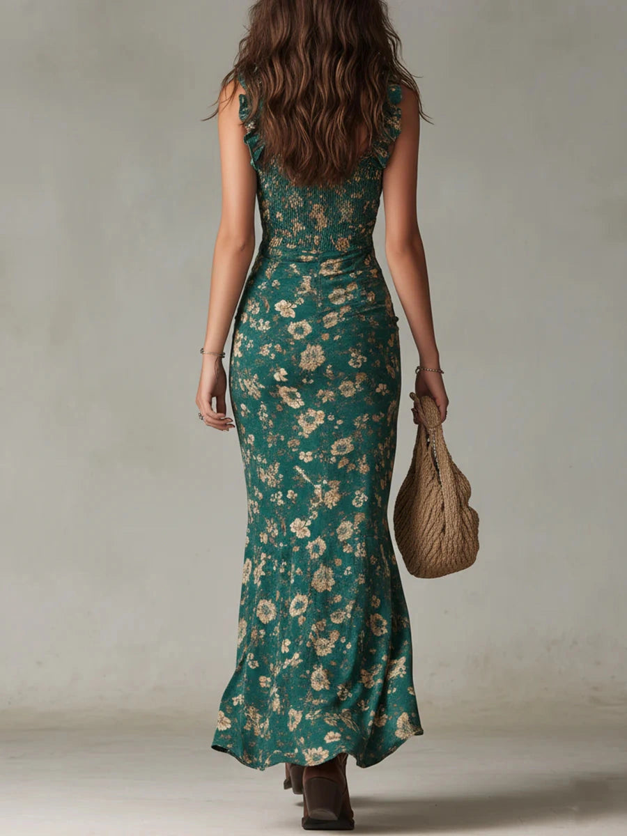 View of a flowing maxi dress in deep emerald green, featuring elegant ruching and a flattering silhouette