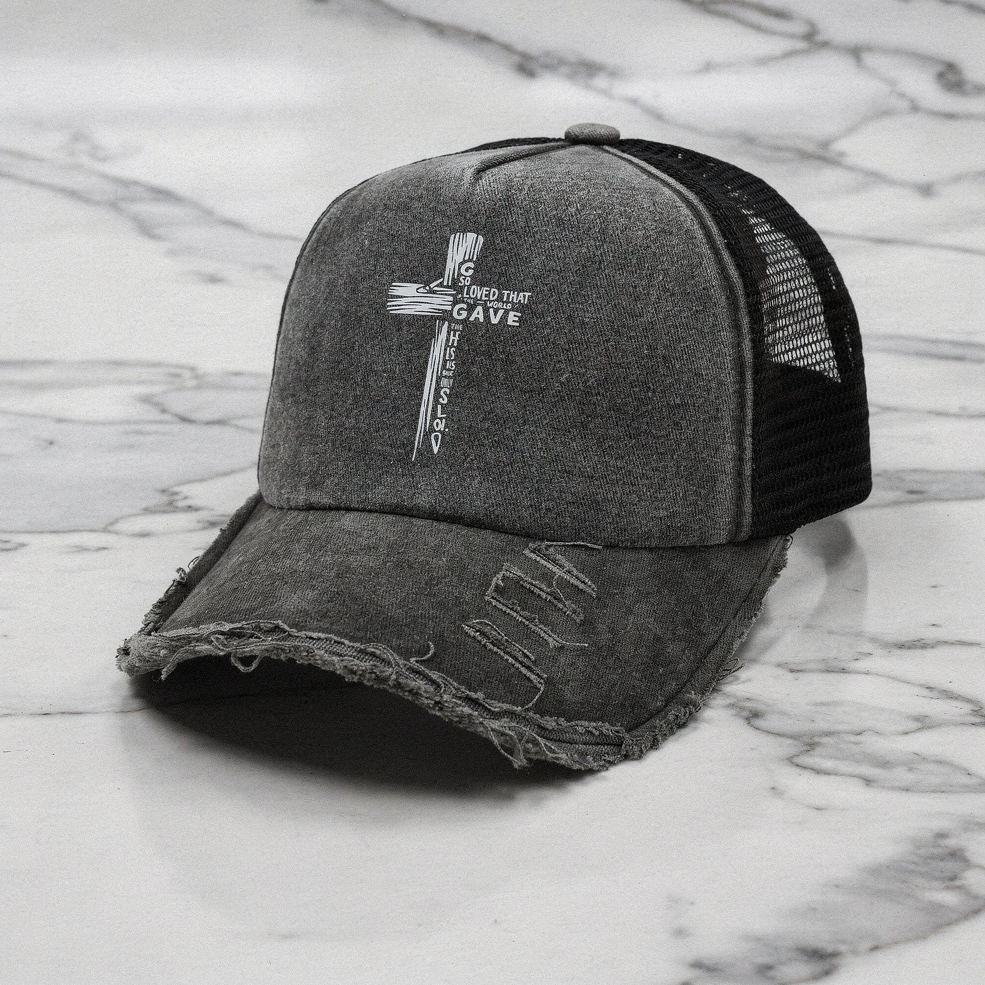 Light pink summer baseball cap made of breathable fabric, featuring a curved brim and adjustable strap, detailed view