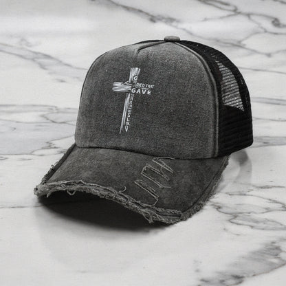 Light pink summer baseball cap made of breathable fabric, featuring a curved brim and adjustable strap, detailed view