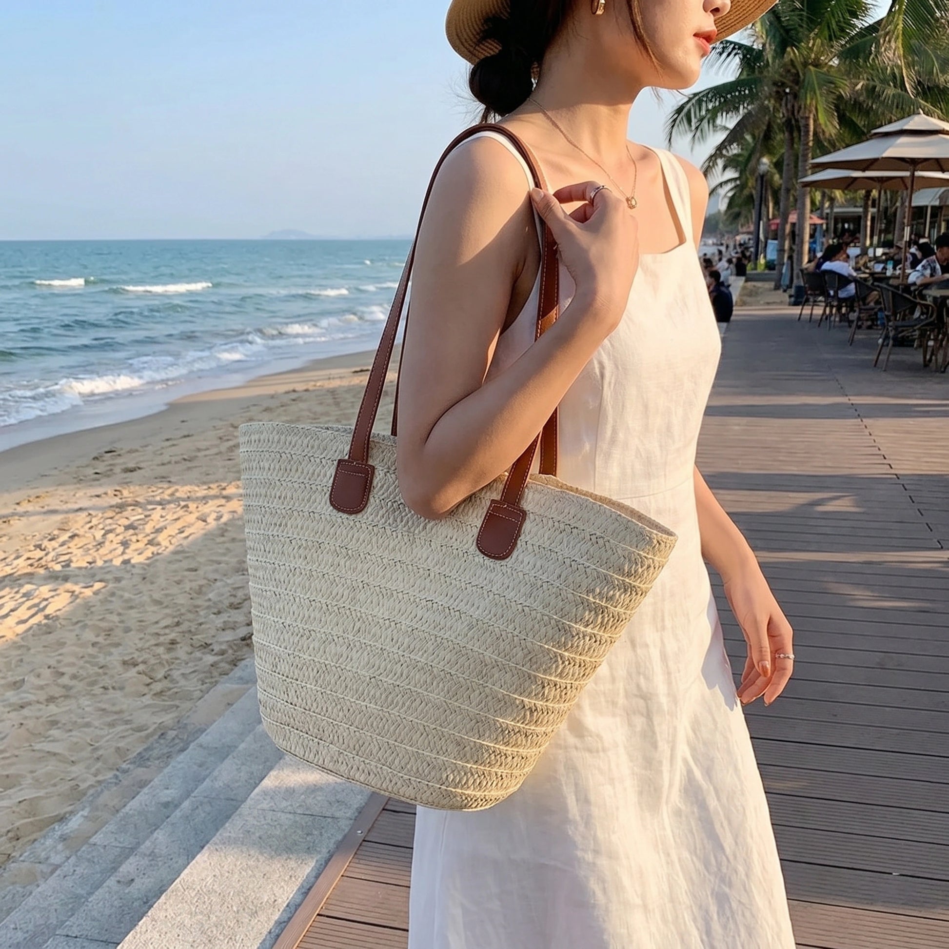 Close up of the Womens Woven Summer Tote showing its textured fabric and intricate stitching, perfect for beach outings and everyday use.