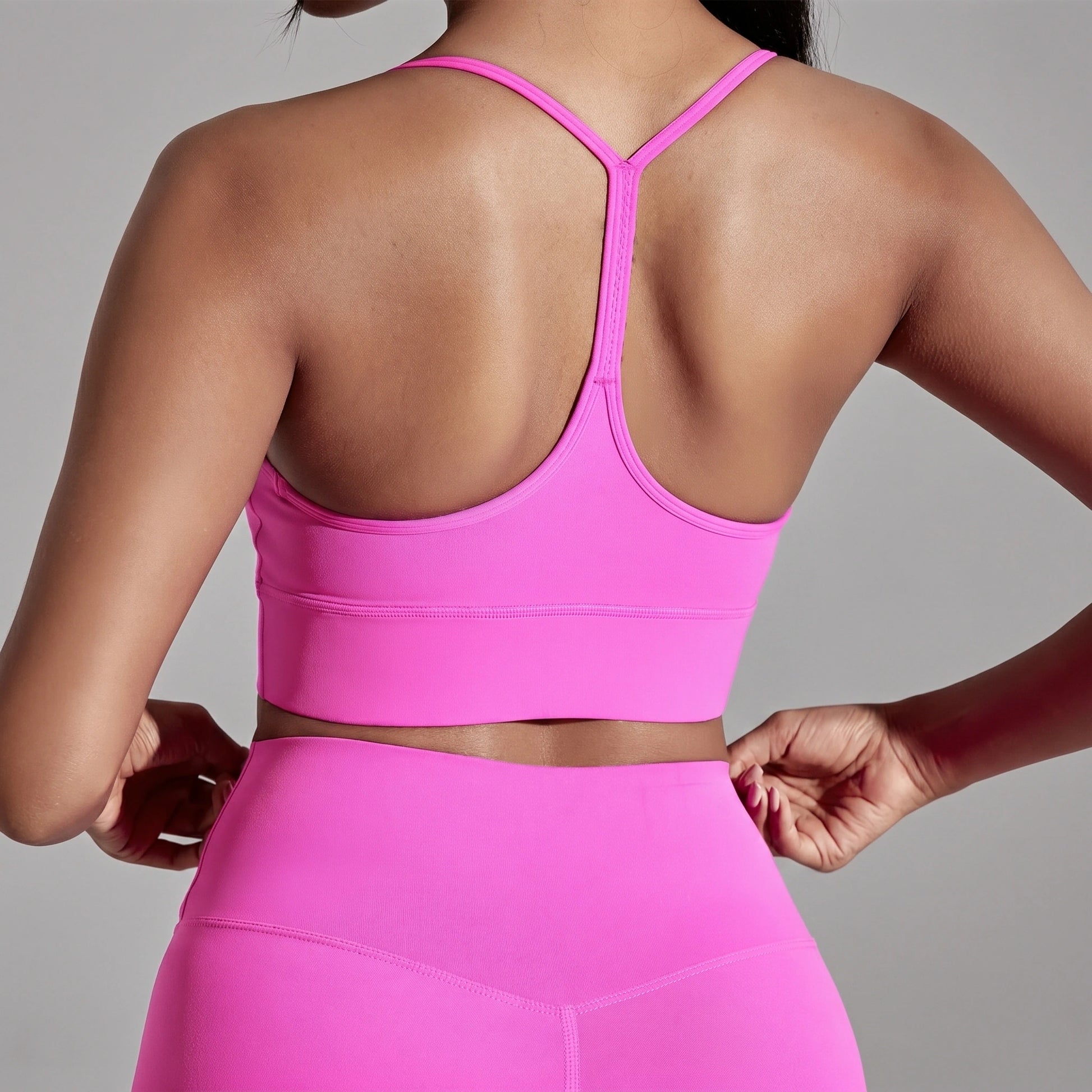 Close up view showing the soft fabric and intricate stitching of the Womens Soft Supportive Athletic Bra in a colorful, ideal for gym and yoga sessions.