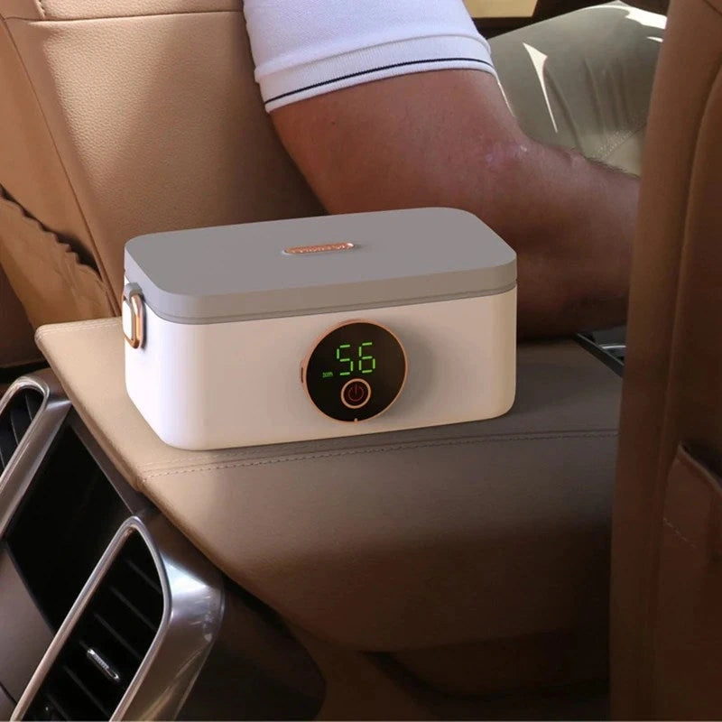 View of a sleek portable electric lunchbox in black, featuring a compact design and easy to use warming function