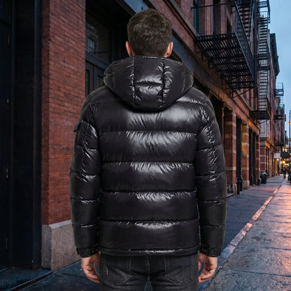 Close up view of the mens warm winter puffer jacket showing the high quality fabric and intricate stitching details against a neutral background.