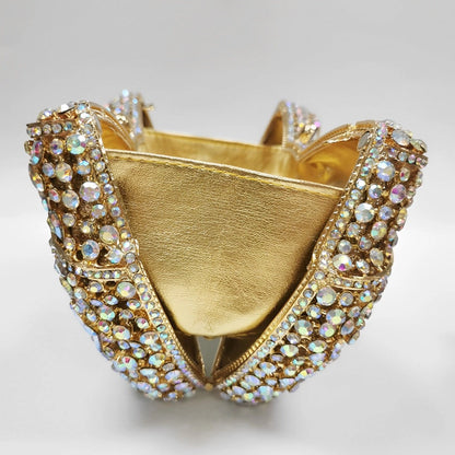 Elegant clutch bag in a soft, textured fabric, featuring sleek design and subtle clasp closure, top view — 10 — view 10