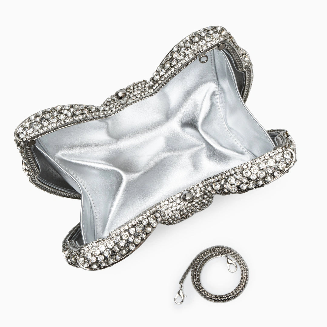 Elegant clutch bag in a soft, textured fabric featuring sleek design and subtle metallic clasp, front view — 13 — view 13