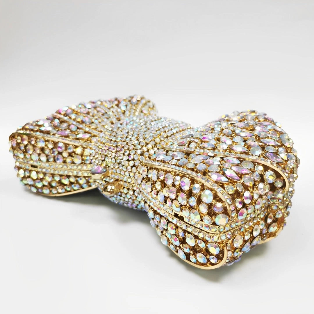 Elegant clutch bag in a soft beige fabric, featuring sleek design and gold tone clasp, top view — 9 — view 9