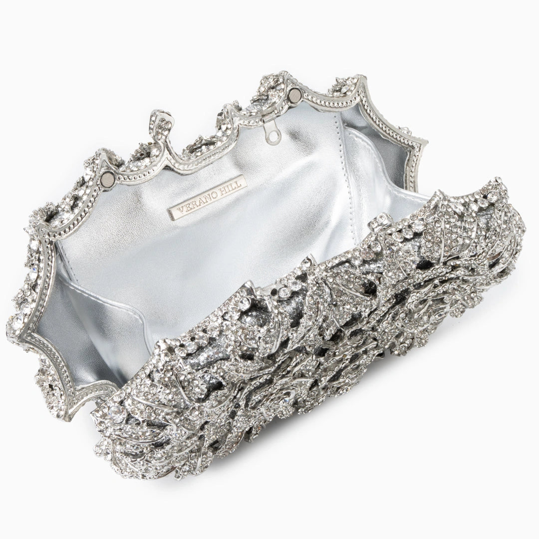 Elegant rose clutch bag in soft leather with a sleek silhouette and subtle metallic clasp, front view — 12 — view 12