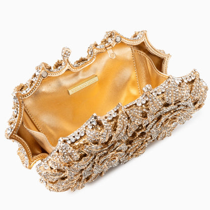 Rose colored clutch bag featuring a sleek design with smooth finish and delicate clasp closure, front view — 4 — view 4