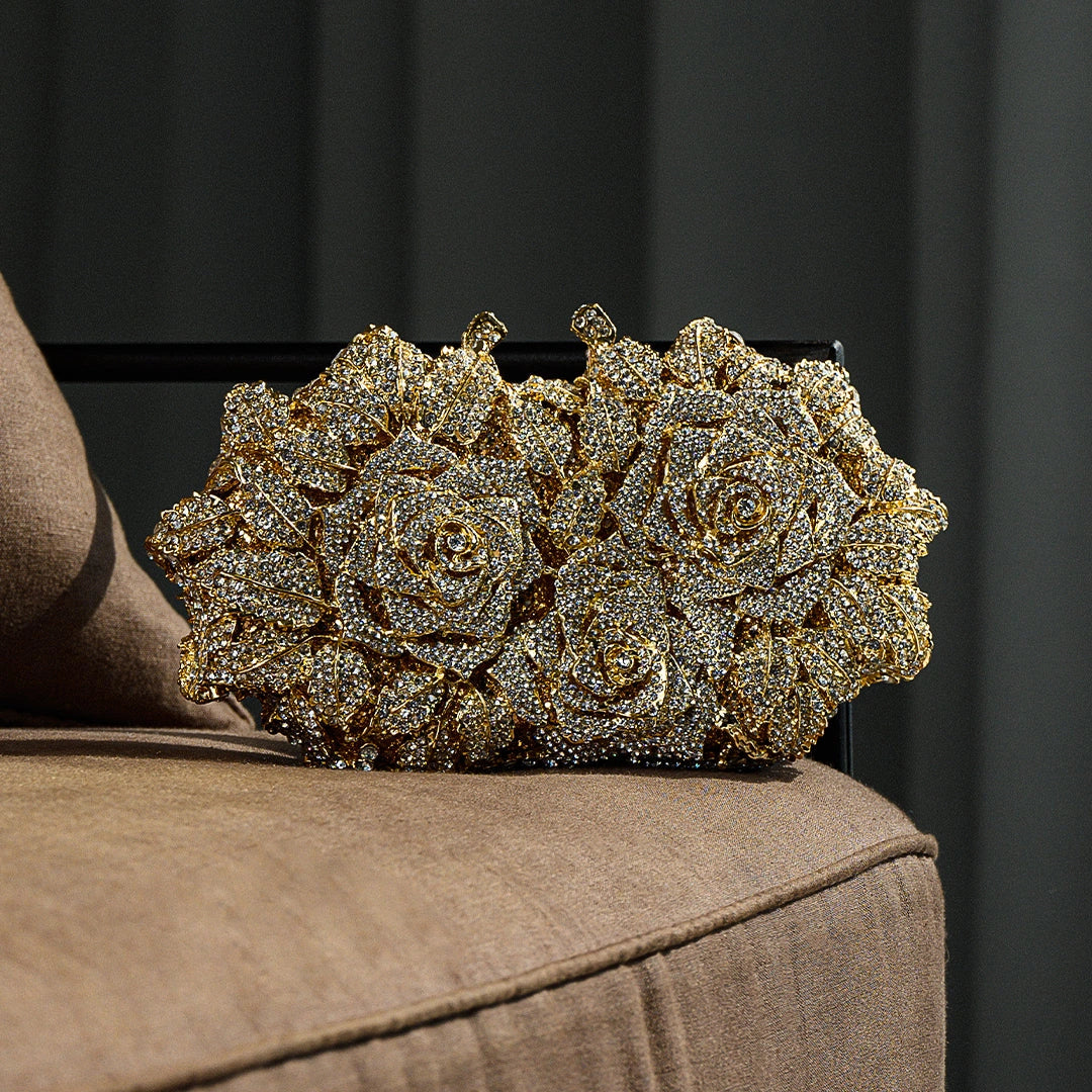 Elegant rose clutch bag made of soft leather, featuring a sleek design with fold over flap and gold tone hardware — view 7