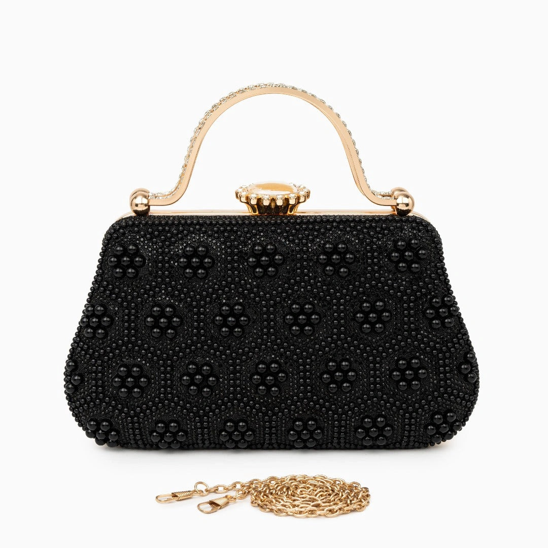 Elegant pearl clutch bag featuring a smooth finish, adorned with subtle clasp, showcasing sophisticated design — view 11
