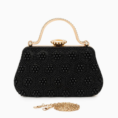 Elegant pearl clutch bag featuring a smooth finish, adorned with subtle clasp, showcasing sophisticated design — view 11