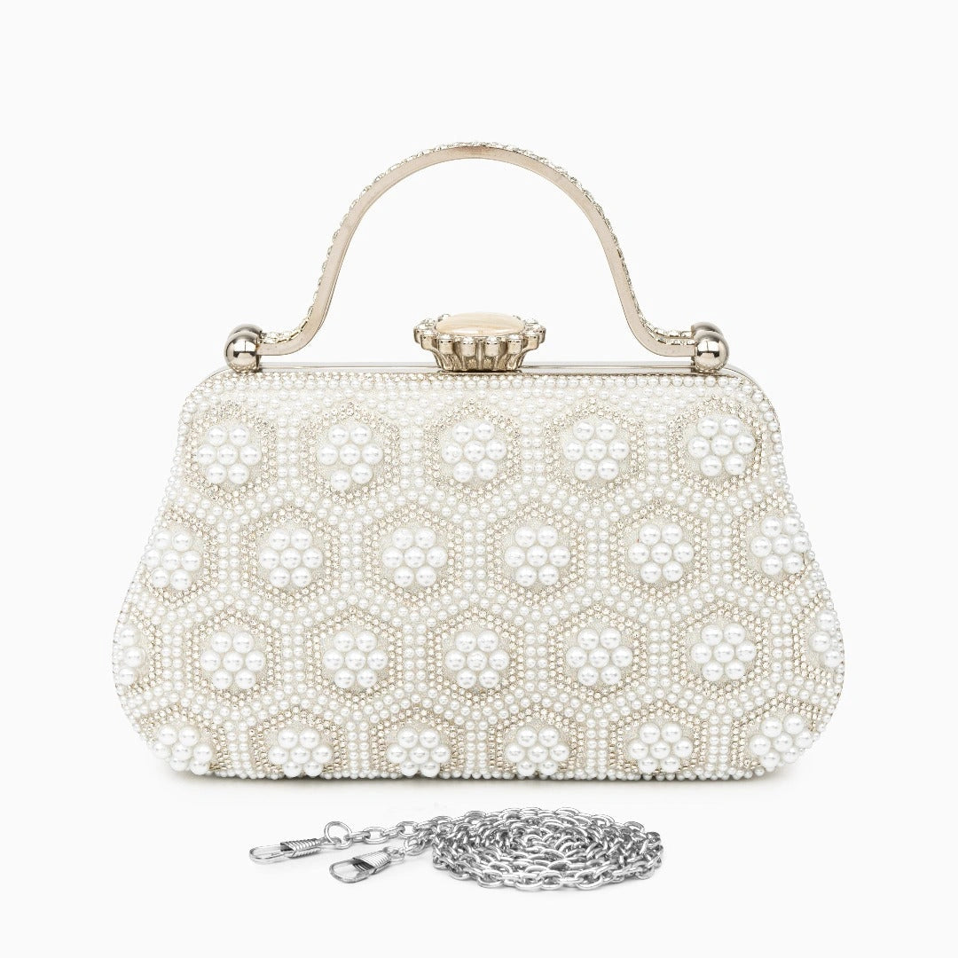 Elegant pearl clutch bag with a textured surface, featuring gold tone clasp and sleek, compact design — view 4 — view 4