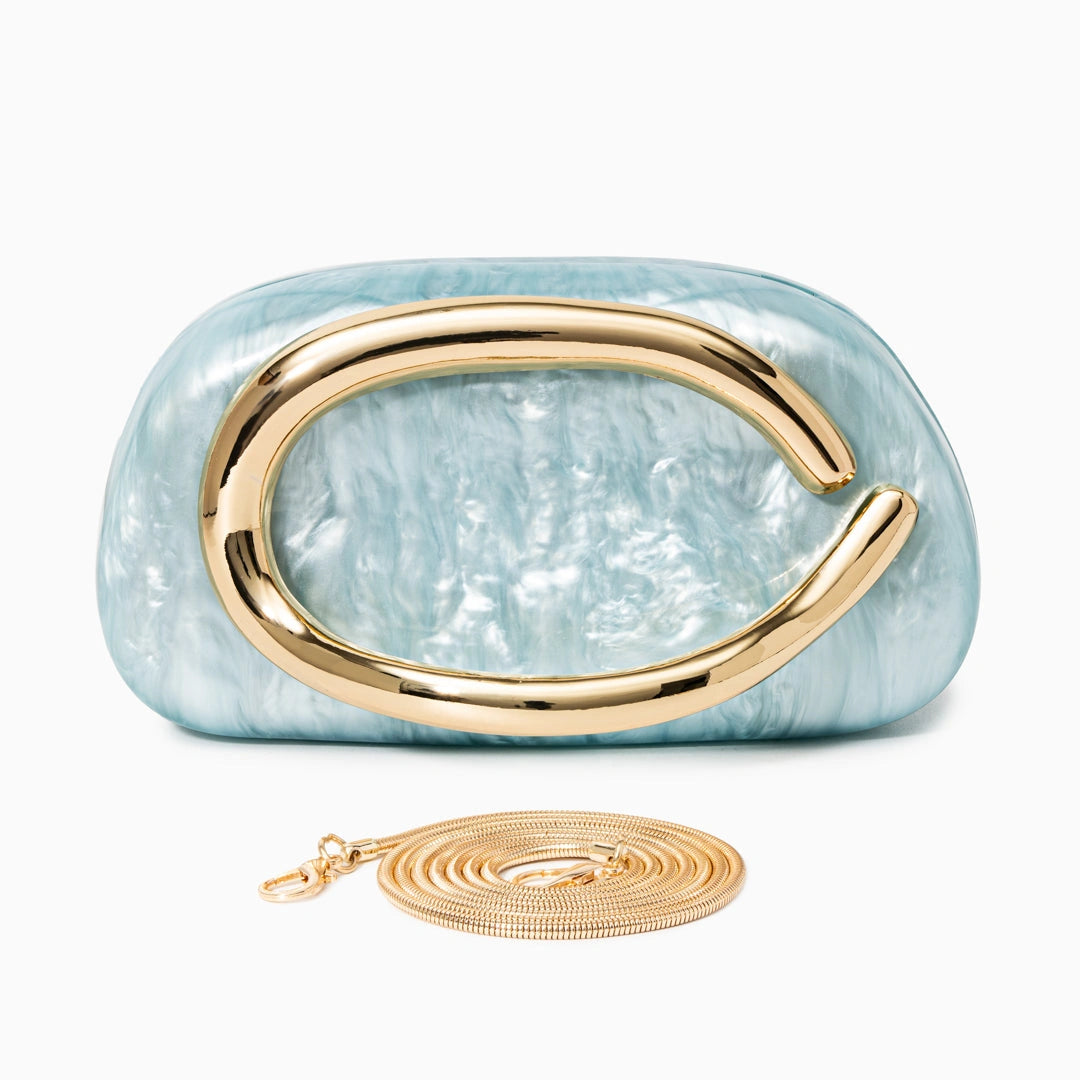 Elegant clutch bag in soft leather with a sleek silhouette, featuring gold tone clasp and minimalist design — view — view 25