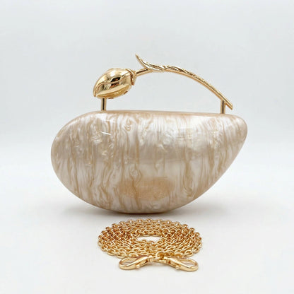 Clear acrylic clutch bag with a geometric design, featuring gold tone clasp and sleek, modern silhouette — view 17 — view 17
