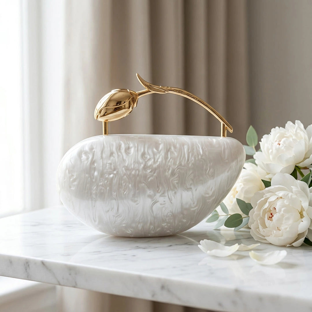 Clear acrylic clutch bag with a geometric design, featuring gold chain strap and clasp closure, angled view — 3 — view 3