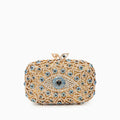 Elegant clutch bag featuring a crystal evil eye design, made of soft fabric with sleek silhouette, front view