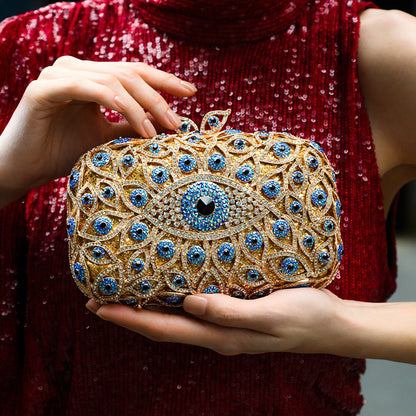 Elegant clutch bag featuring a crystal evil eye design, showcasing intricate details and vibrant color palette — view 3