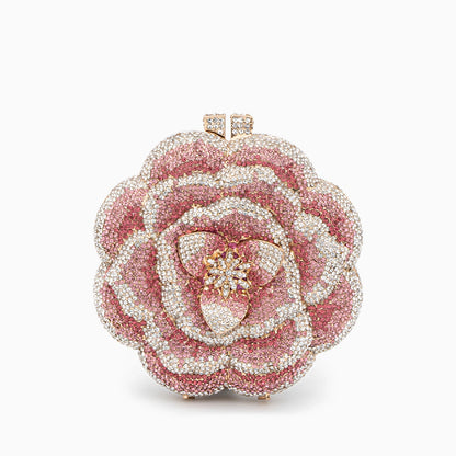 Elegant floral clutch bag featuring a vibrant pattern on soft fabric, top view showcasing the clasp closure