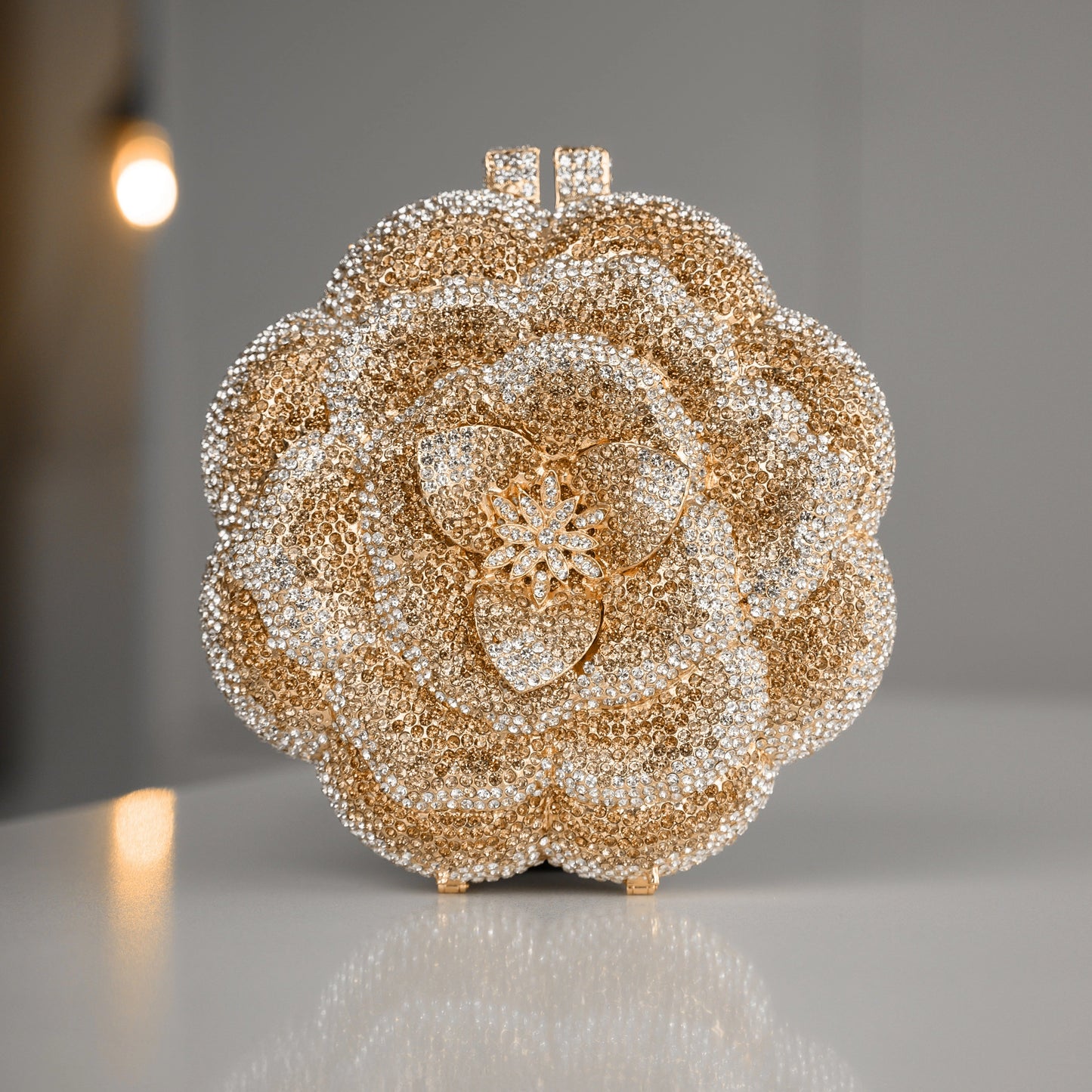 Elegant floral clutch bag featuring a vibrant pattern on soft fabric, top view showcasing the clasp closure — 13 — view 13