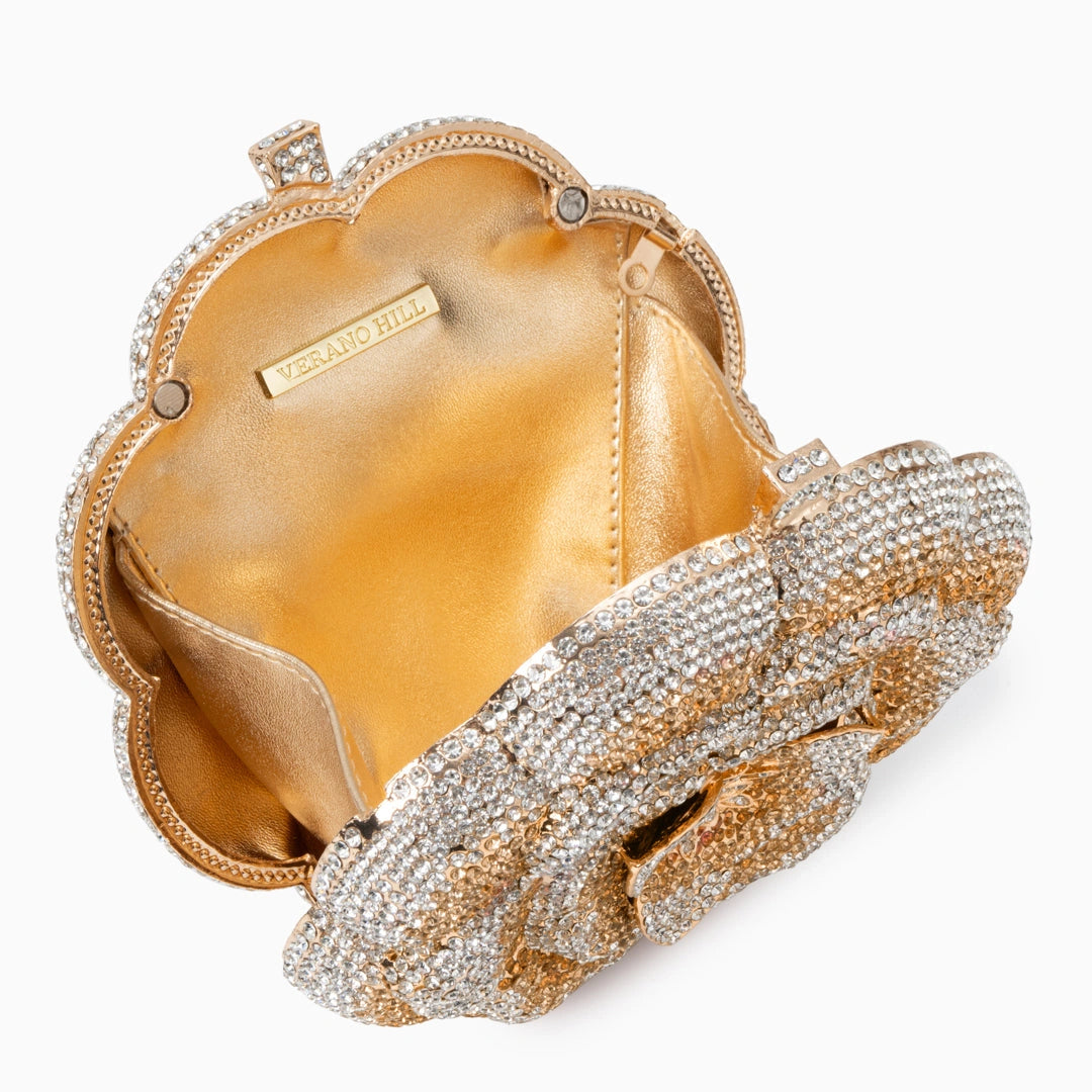Elegant floral clutch bag featuring a vibrant pattern on soft fabric, showcasing sleek design with clasp closure — view 14