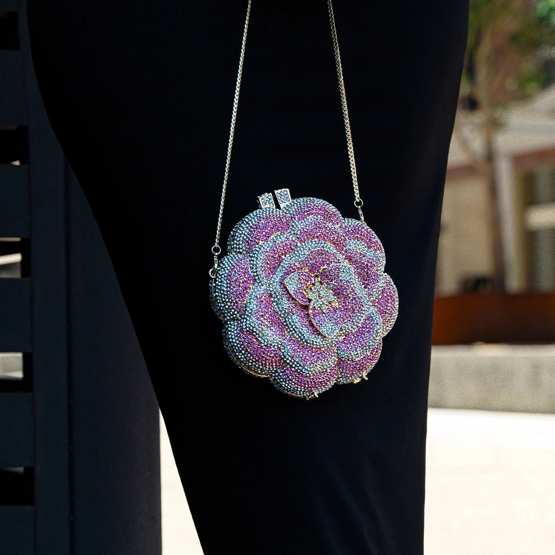 Elegant floral clutch bag featuring a vibrant pattern on soft fabric, top view showcasing the clasp closure — 3 — view 3
