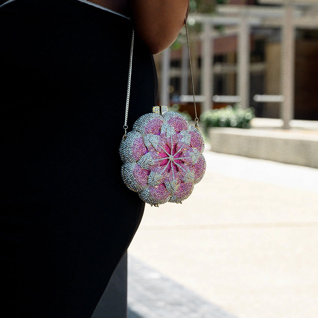 Elegant floral clutch bag featuring a vibrant pattern, soft fabric, and sleek, compact design — view 5 — view 5