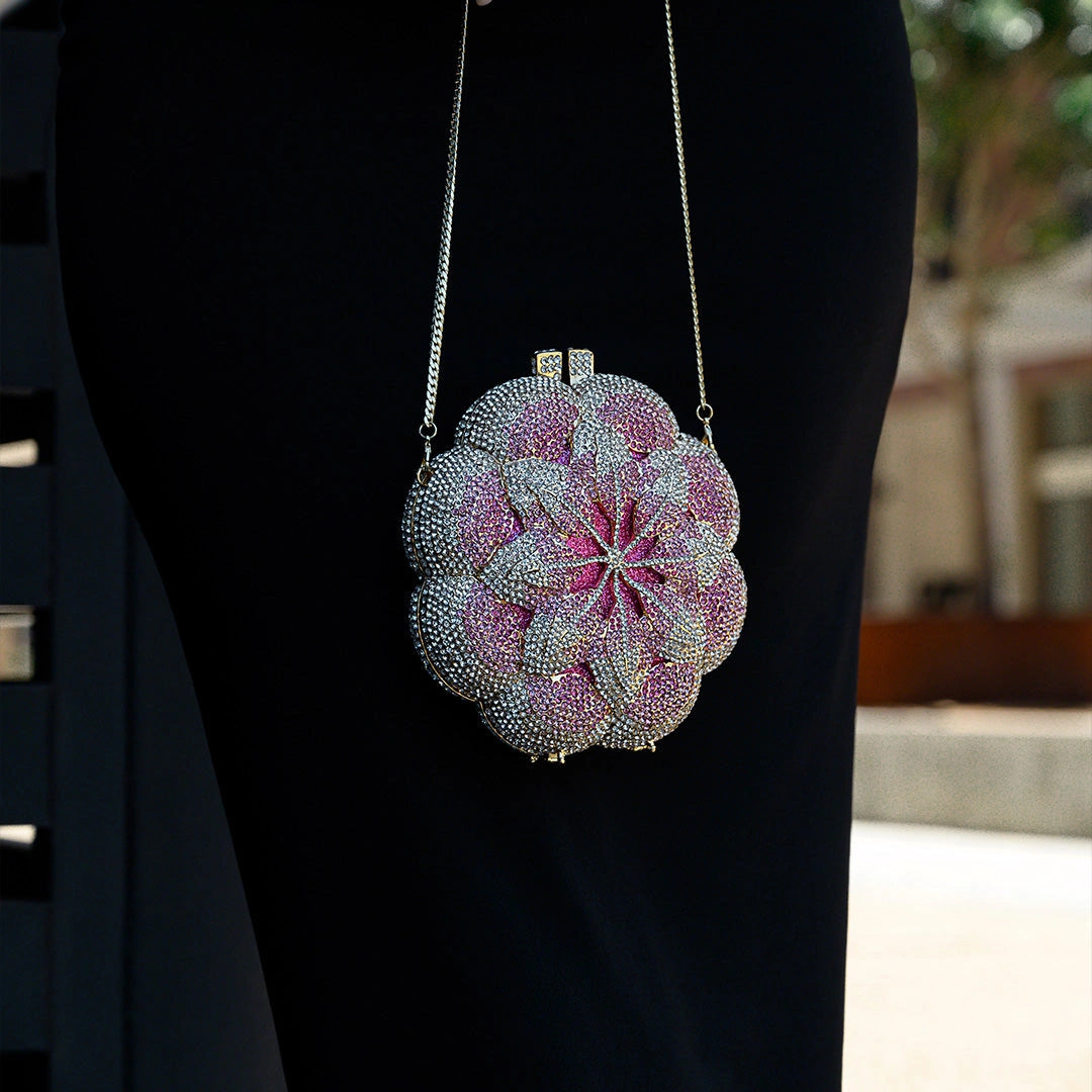 Elegant floral clutch bag featuring a vibrant pattern on soft fabric, showcasing top zipper closure and compact — view 7