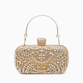 Elegant floral clutch bag featuring a vibrant pattern, made from soft fabric, shown in close up view
