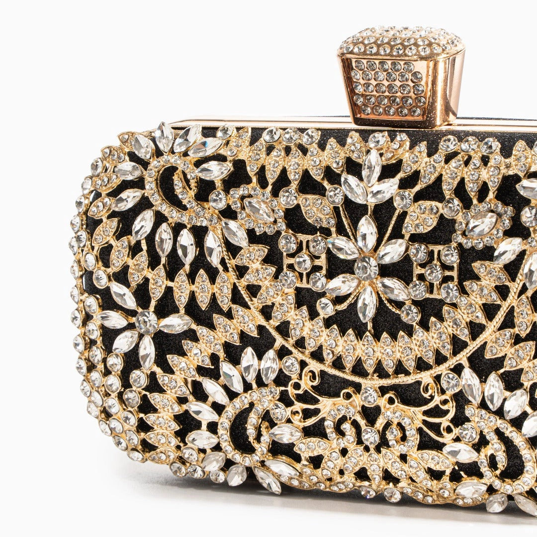 Elegant floral clutch bag featuring a vibrant pattern, soft fabric, and stylish clasp closure, top view — 16 — view 16