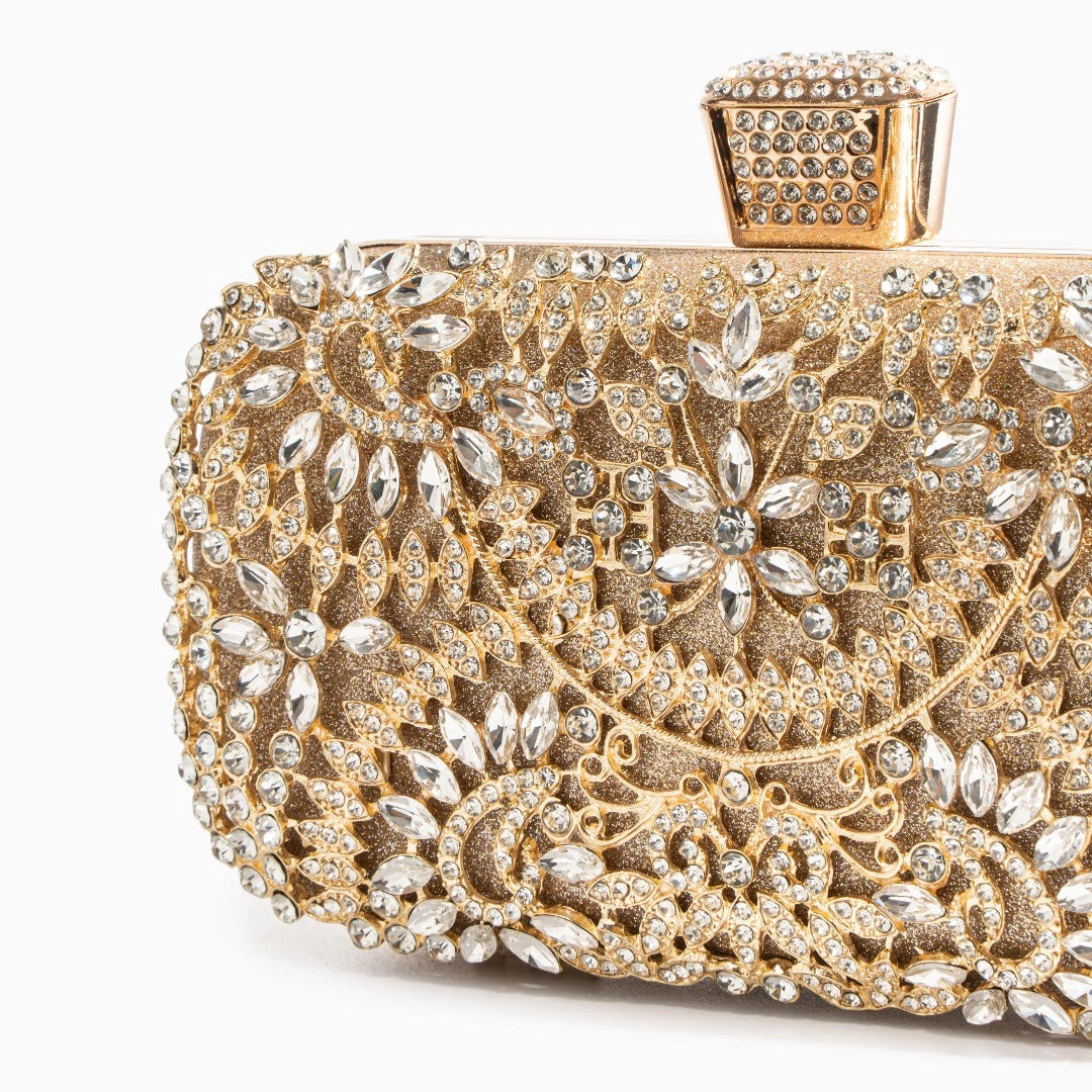 Elegant floral clutch bag featuring a vibrant pattern and sleek design, showcasing top view with gold clasp — 2 — view 2
