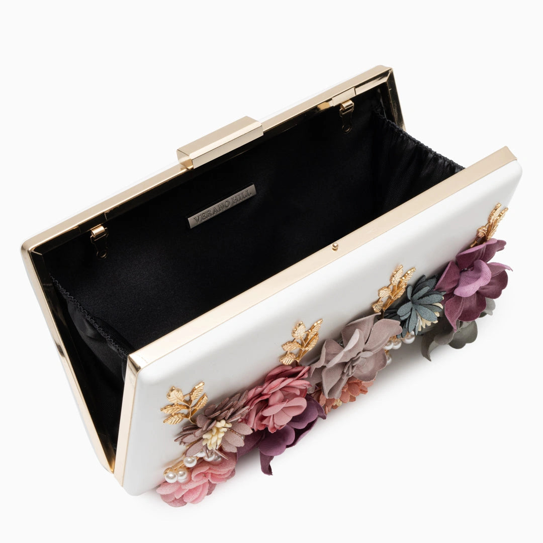 Scarlett red clutch bag adorned with a floral pattern, featuring sleek design and top clasp closure — view 4 — view 4