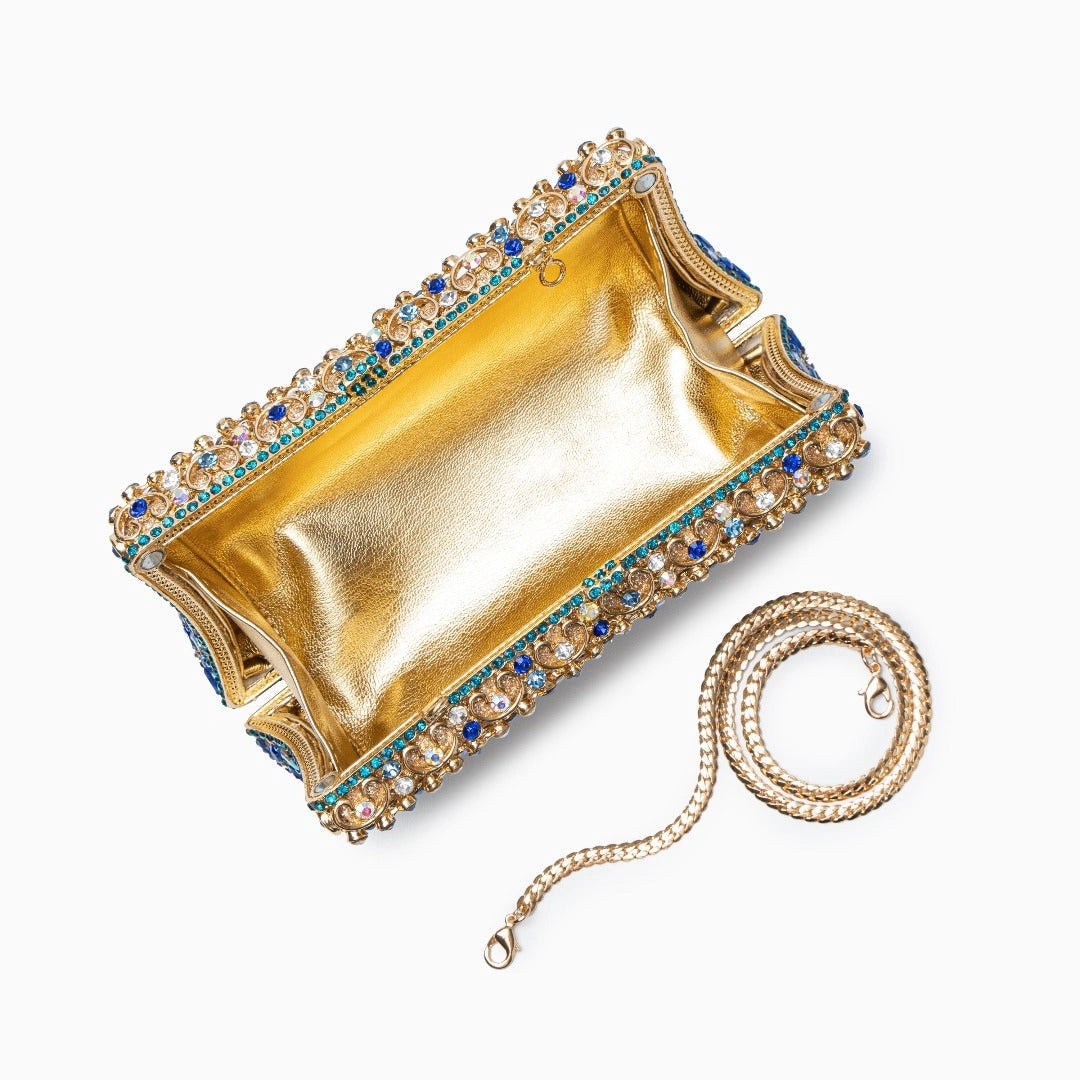 Elegant clutch bag in soft beige leather, featuring a sleek design and subtle metallic clasp, top view — 7 — view 7