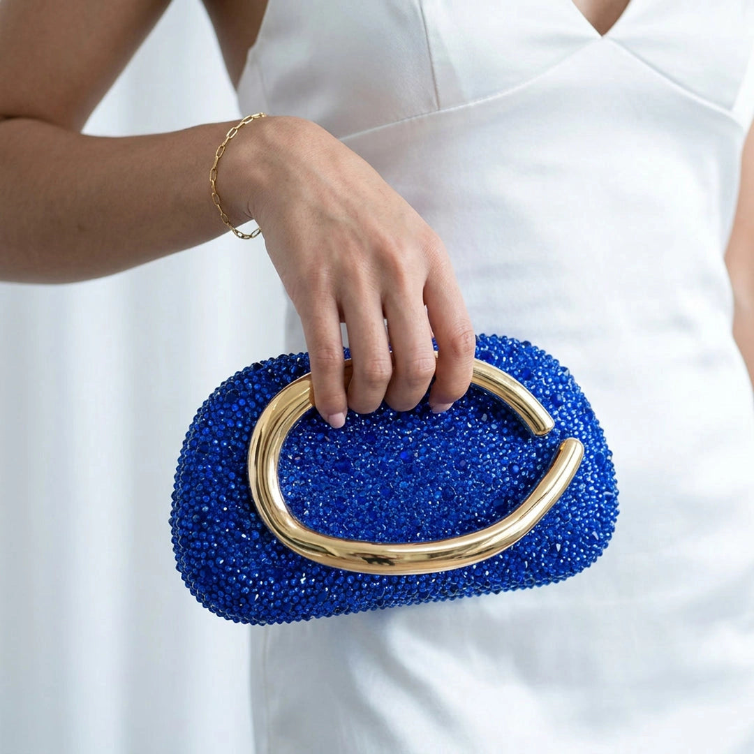 Elegant clutch bag in a rich burgundy hue, featuring sleek design and subtle clasp closure, front view — 23 — view 23