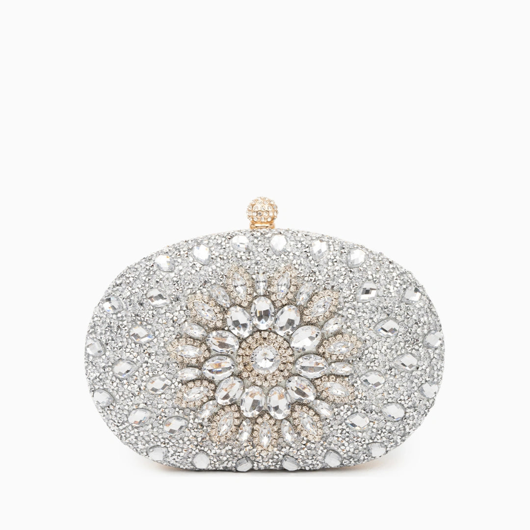 Elegant clutch bag in soft leather with a sleek silhouette, featuring gold tone clasp and subtle textured finish — view 22